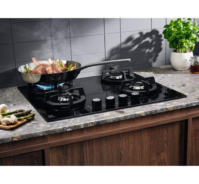 Варочная поверхность Electrolux газ на стекле, 60см, чугун, черный