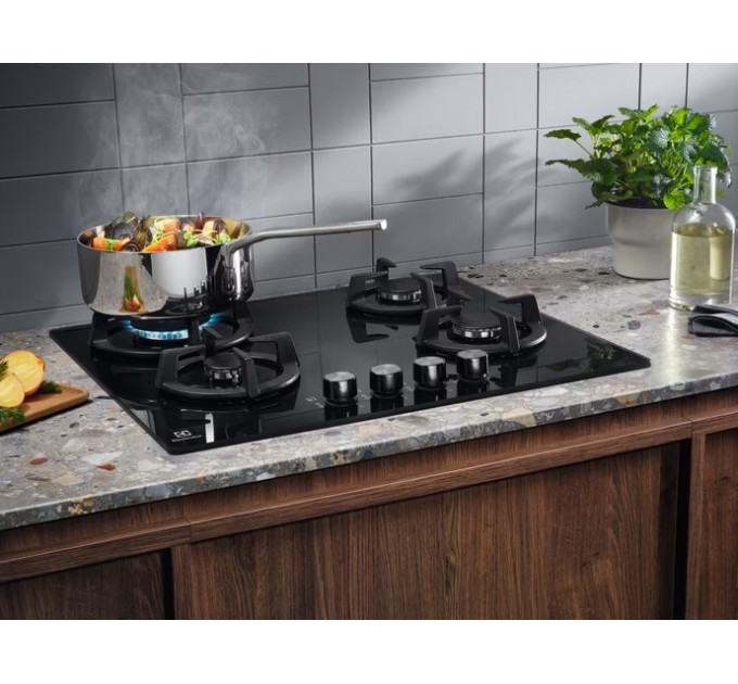 Варочная поверхность Electrolux газ на стекле, 60см, чугун, черный