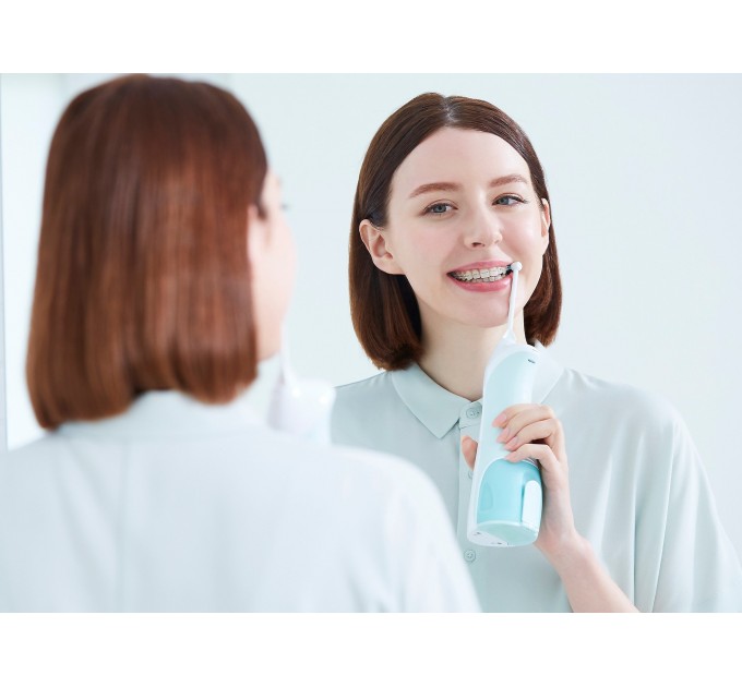 Ирригатор Panasonic портативний, чаша 130 мл, Ni-Mh аккум. в компл., бело-голубой
