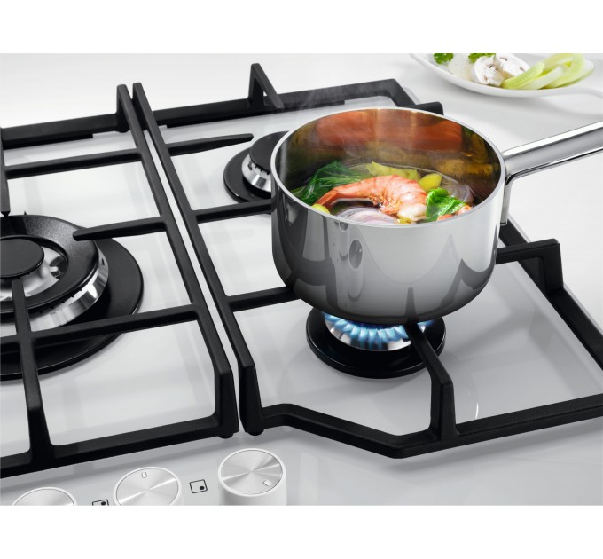 Варочная поверхность Electrolux газ на стекле, 60см, чугун, белый