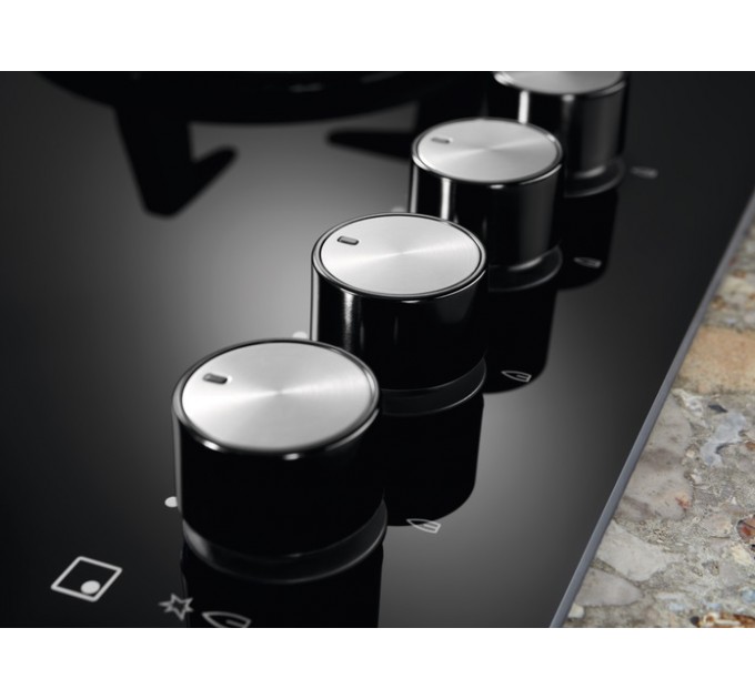 Варочная поверхность Electrolux газ на стекле, 60см, чугун, черный