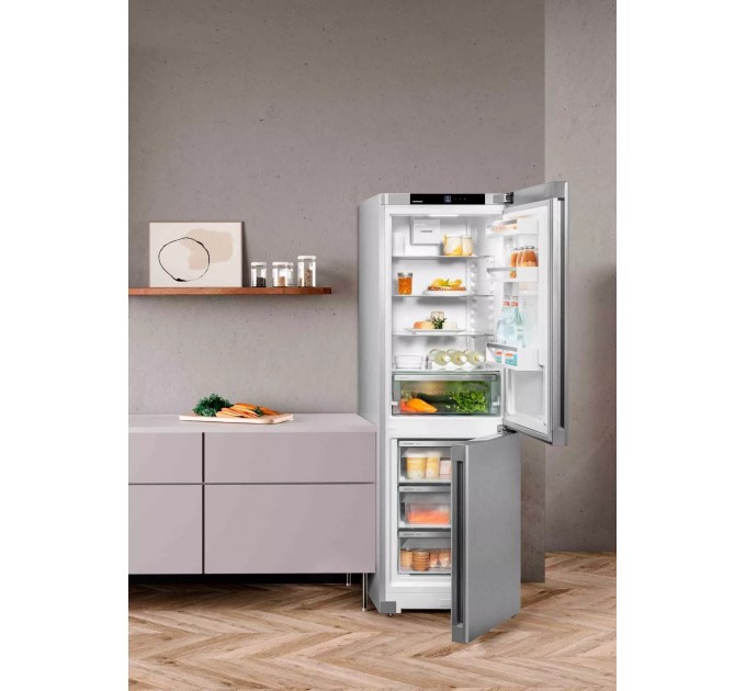 Холодильник Liebherr з нижн. мороз., 185.5x59.7х67.5, холод.відд.-225л, мороз.відд.-94л, 2дв., D, NF, диспл внутр., сірий