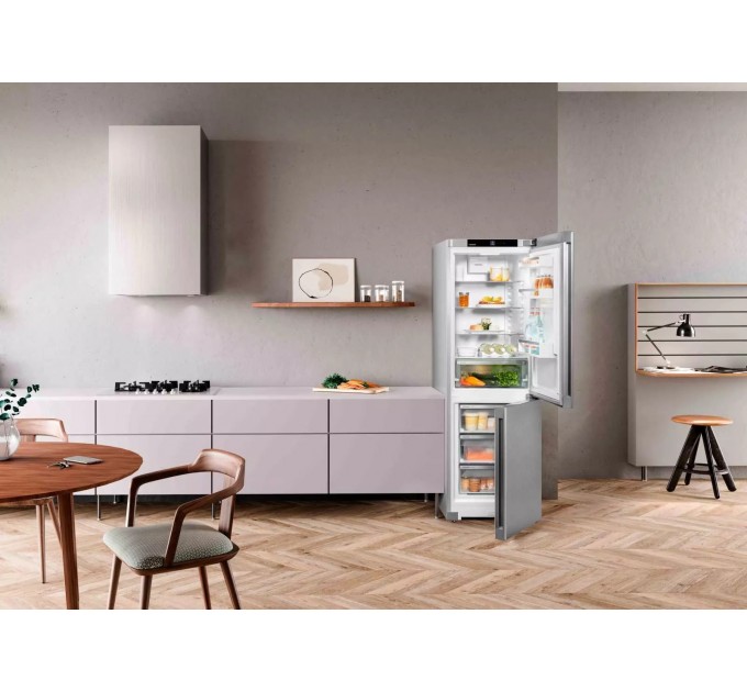 Холодильник Liebherr з нижн. мороз., 185.5x59.7х67.5, холод.відд.-225л, мороз.відд.-94л, 2дв., D, NF, диспл внутр., сірий