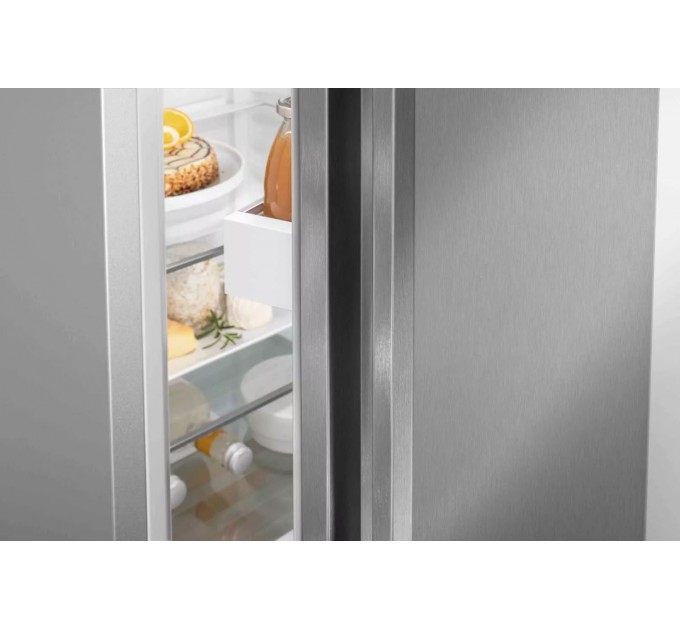 Холодильник Liebherr з нижн. мороз., 185.5x59.7х67.5, холод.відд.-225л, мороз.відд.-94л, 2дв., D, NF, диспл внутр., сірий